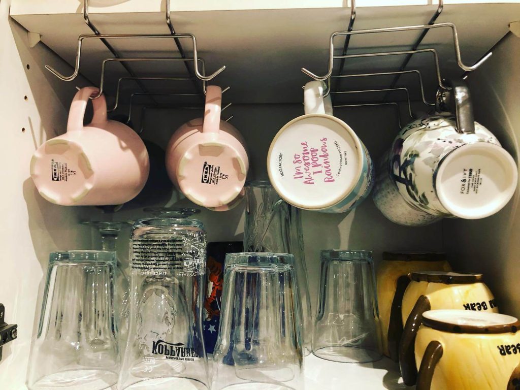 10. Under-Shelf Mug Racks to Expand Storage Instantly