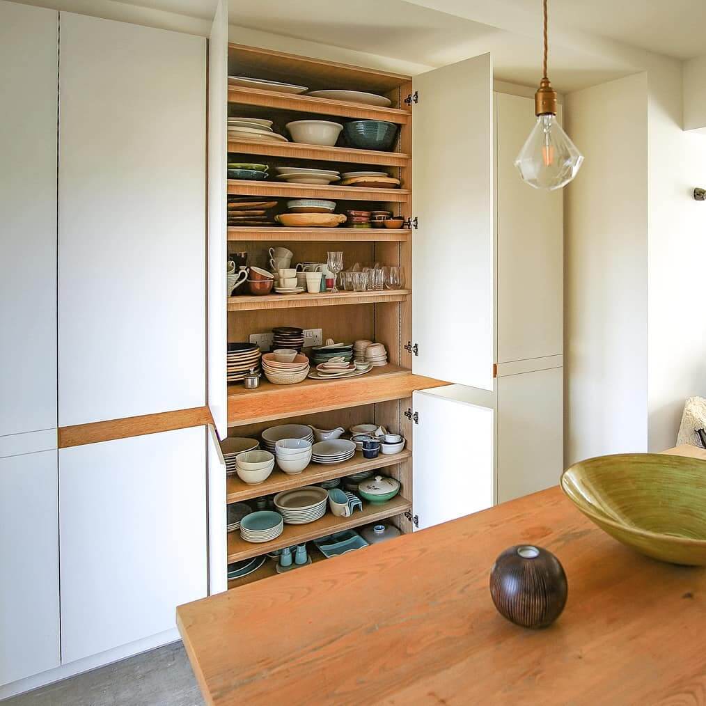 12. Dedicated Dish Cabinet with Categorized Shelving
