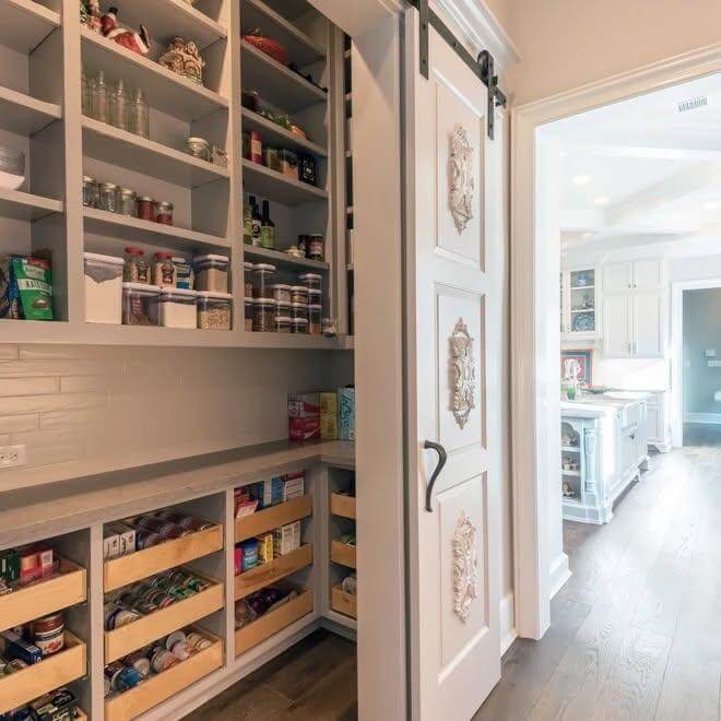 12. Slide-Out Drawer Pantry with Decorative Barn Door Charm