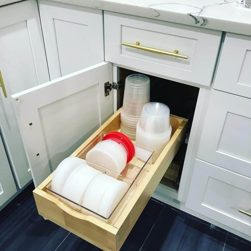 12. Use Acrylic Bins to Organize Round Plastic Lids