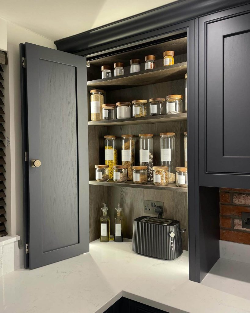 13. Compact Pantry Cupboard with Matte Black Details