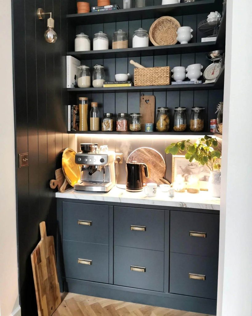 13. Dark & Moody: A Bold Pantry Nook With Luxe Appeal