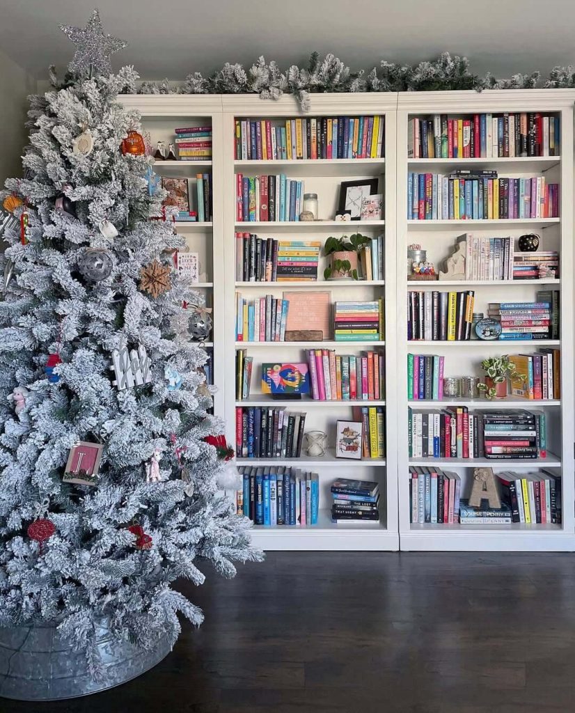 13. Festive Bookshelf with a Touch of Holiday Cheer