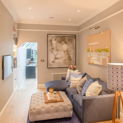 13. Sleek and Stylish Small Living Room with a Modern Twist