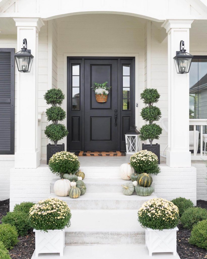 14. Monochrome Elegance with Natural Greens and Whites