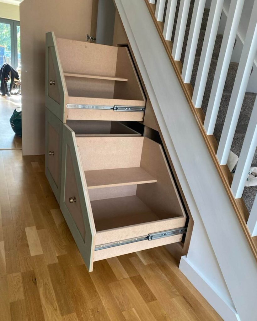 14. DIY-Friendly Under-Stairs Drawer System