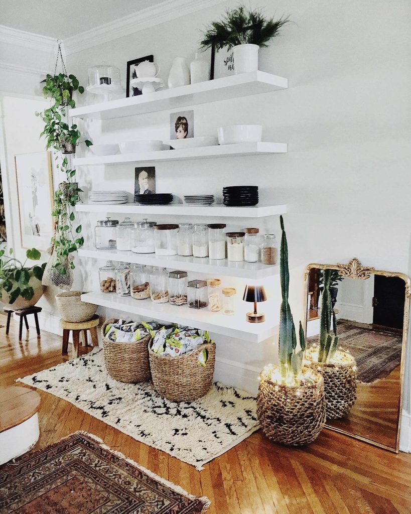 14. Floating White Shelves in an Eclectic Living-Dining Space