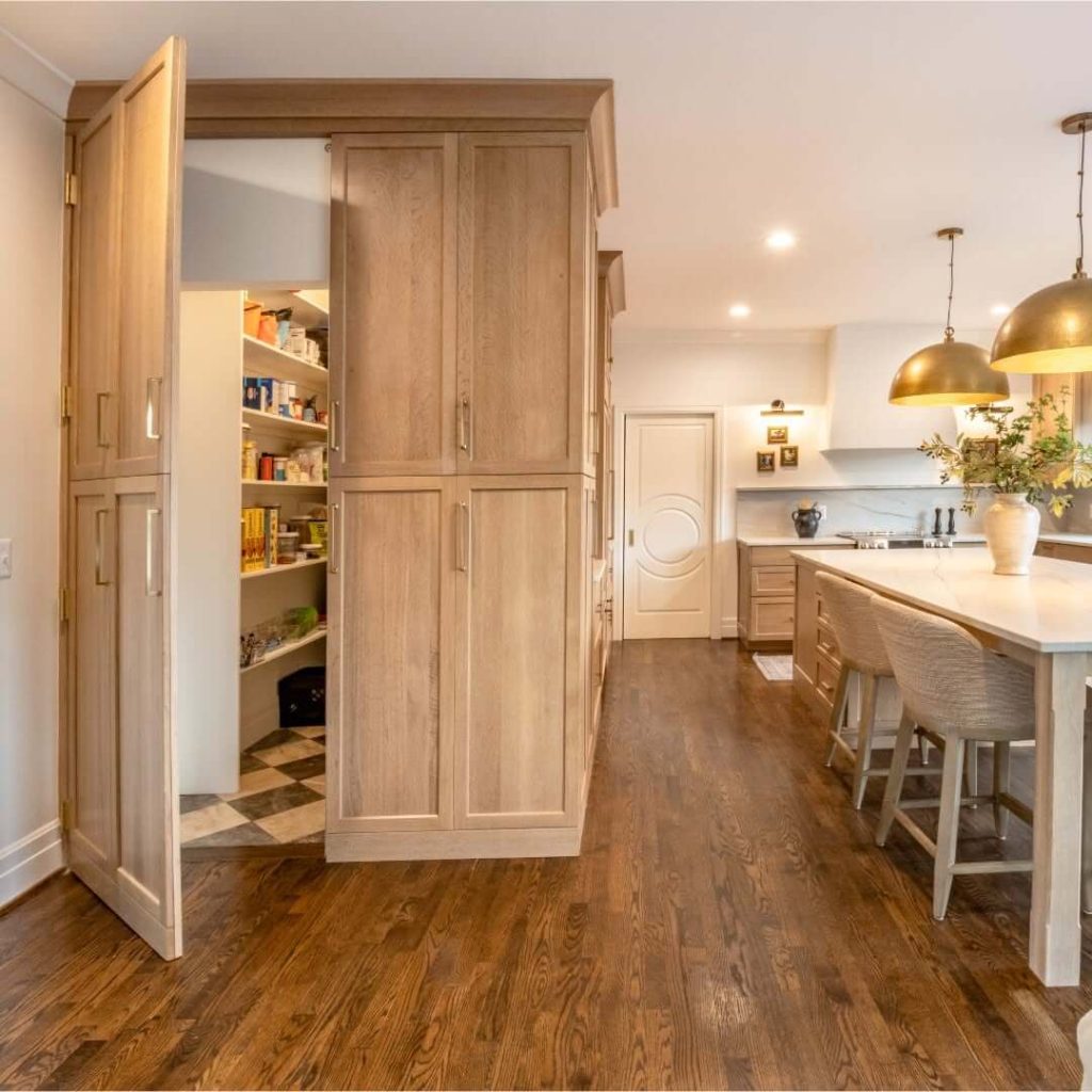 14. Walk-In Pantry Hidden Behind Cabinet Doors