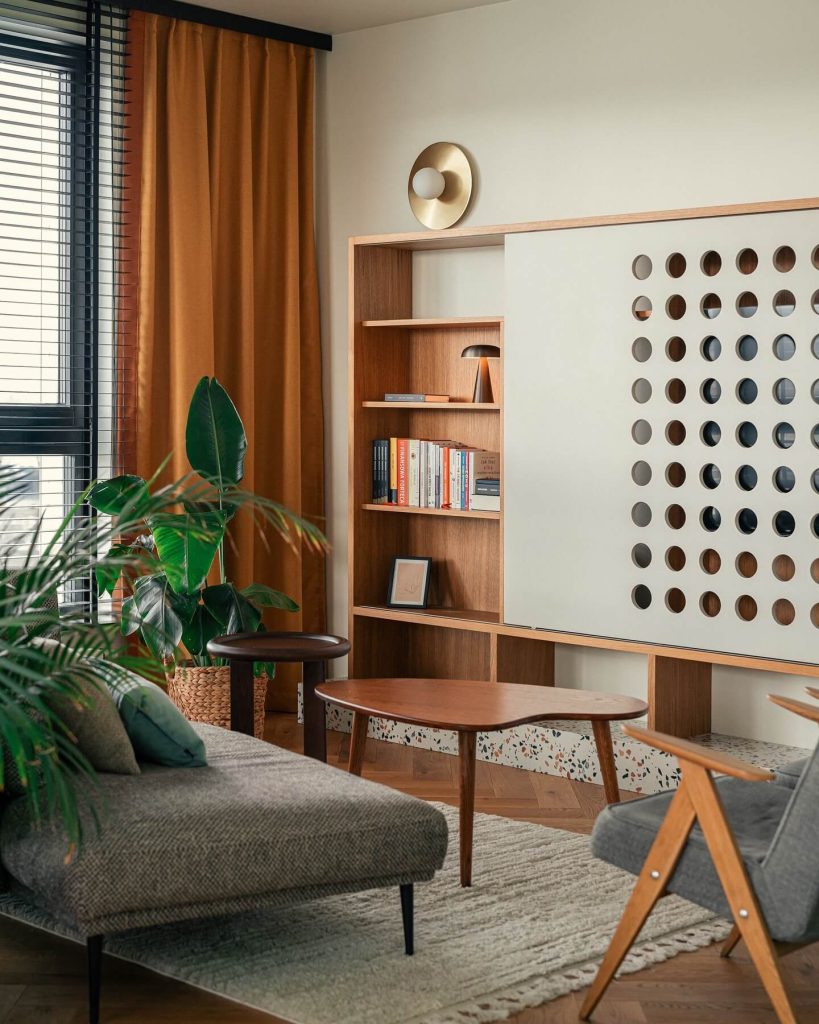 14. Warm and Retro-Inspired Living Room with Geometric Charm
