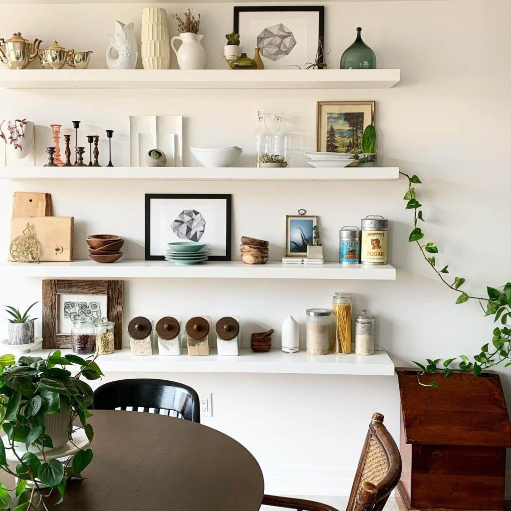 15. Artful & Functional: Pantry Shelves as a Gallery Wall