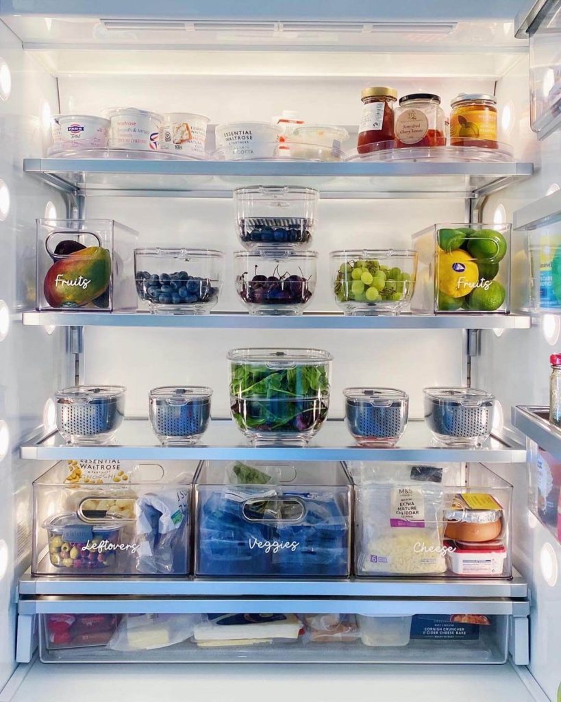 15. Functional and Stylish Fridge Organization with Labeled Containers