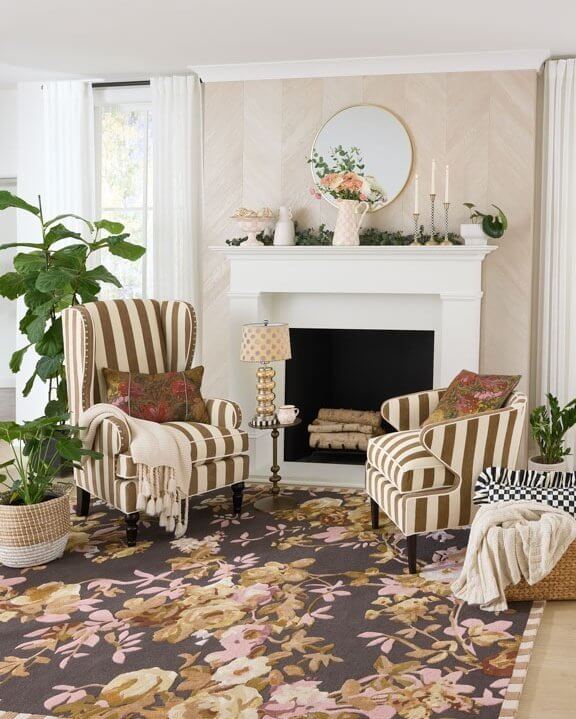 16. Style a Cozy Seating Area with Autumn Florals and Stripes