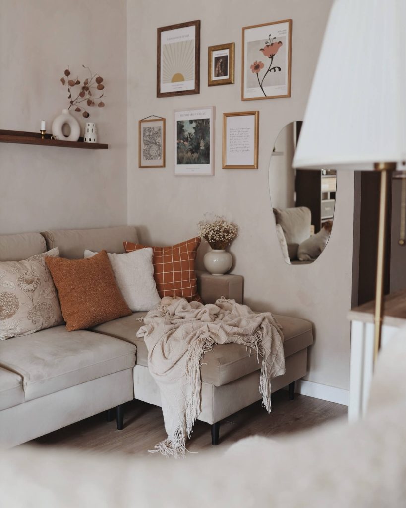 16. Cozy and Artsy Living Room with Wall Art Gallery