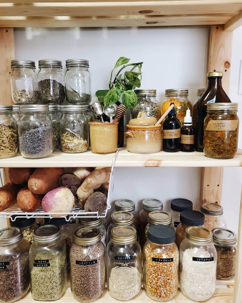 16. Rustic Herbalist Vibes: Mason Jar Storage With Natural Touches