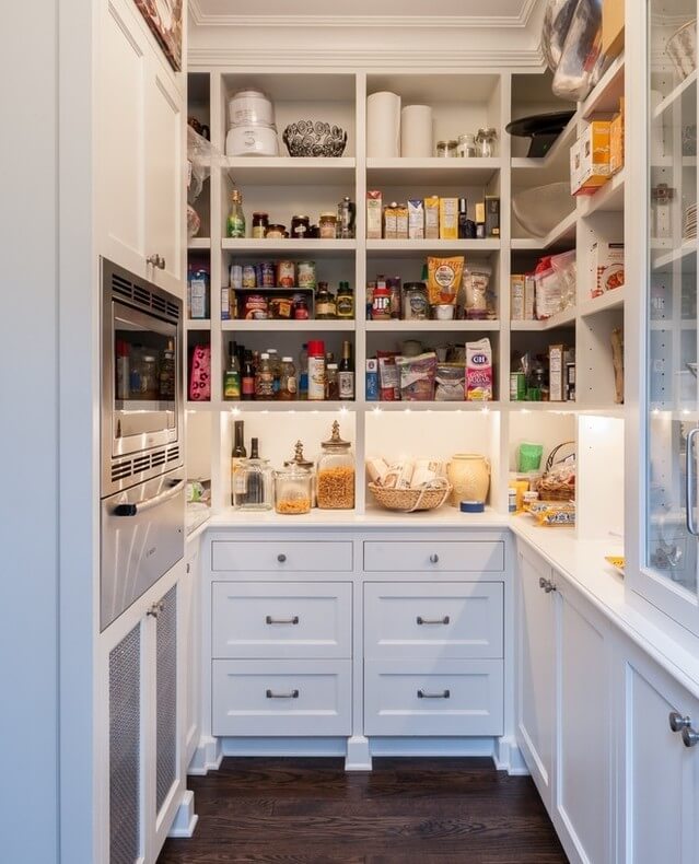 17. Custom Built-In Pantry with Cubby Storage and Lighting