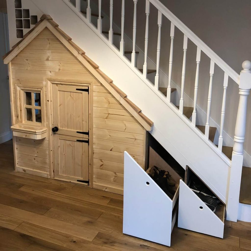 17. Under-Stair Playhouse with Hidden Shoe Drawers