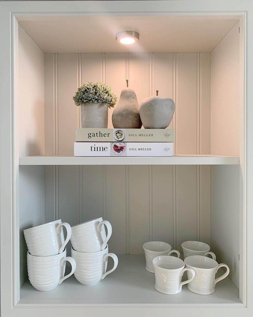 18. Open Shelf Mug Display with Decorative Touches