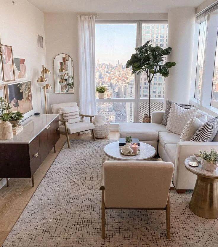 18. Sleek Living Room with Stunning City Views