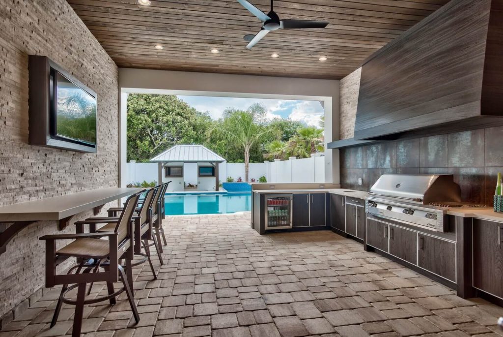 19. Covered Pool Pavilion Kitchen with Lounge Seating