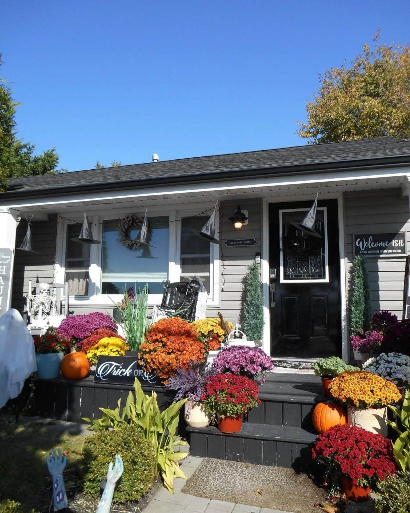 21. Go Bold with a Chrysanthemum-Filled Porch Display