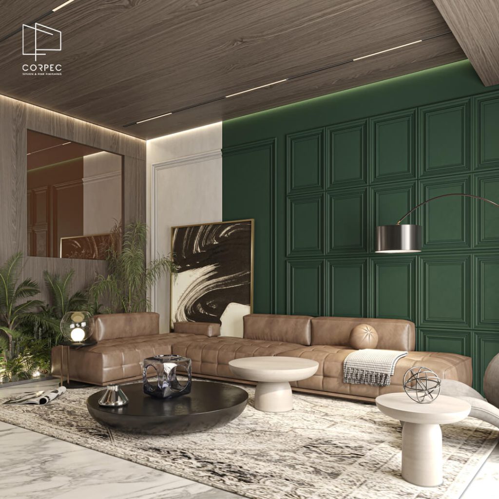 21. Bold Green Accent Wall with Warm Leather: Modern Luxe Vibes