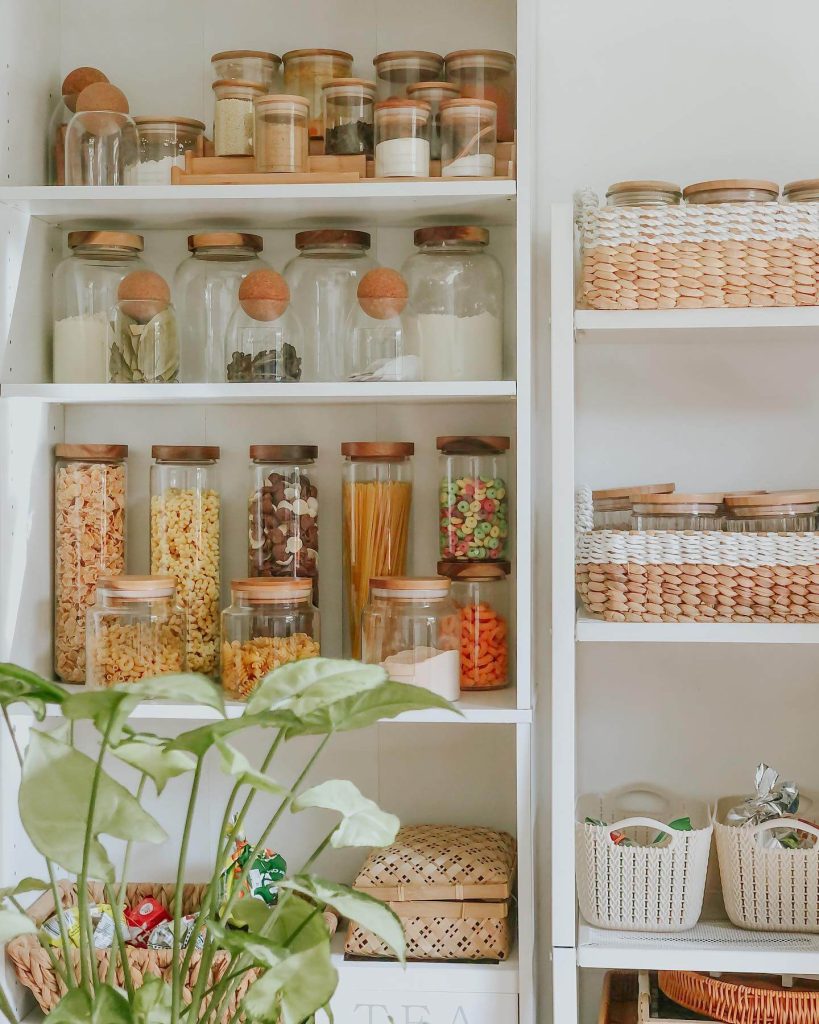 23. Jar Heaven: Cork-Lidded Glass Storage in a Warm White Pantry