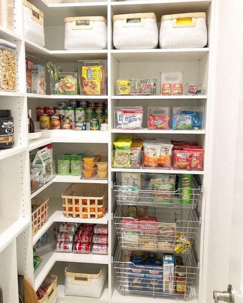 23. Kid-Friendly Pantry with Clear Bins and Snack Zones