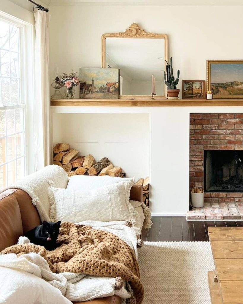 25. Create a Cozy Cottage Vibe with Soft Layers and Classic Art