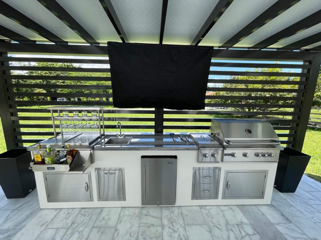 3. Luxury Entertaining with Built-In Bar and TV