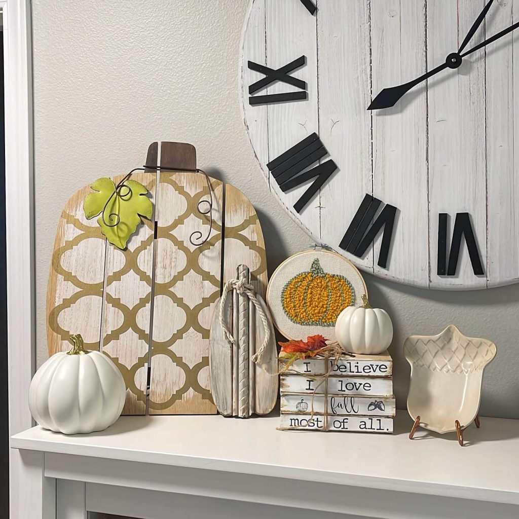6. Create a Charming Pumpkin Mantel Display