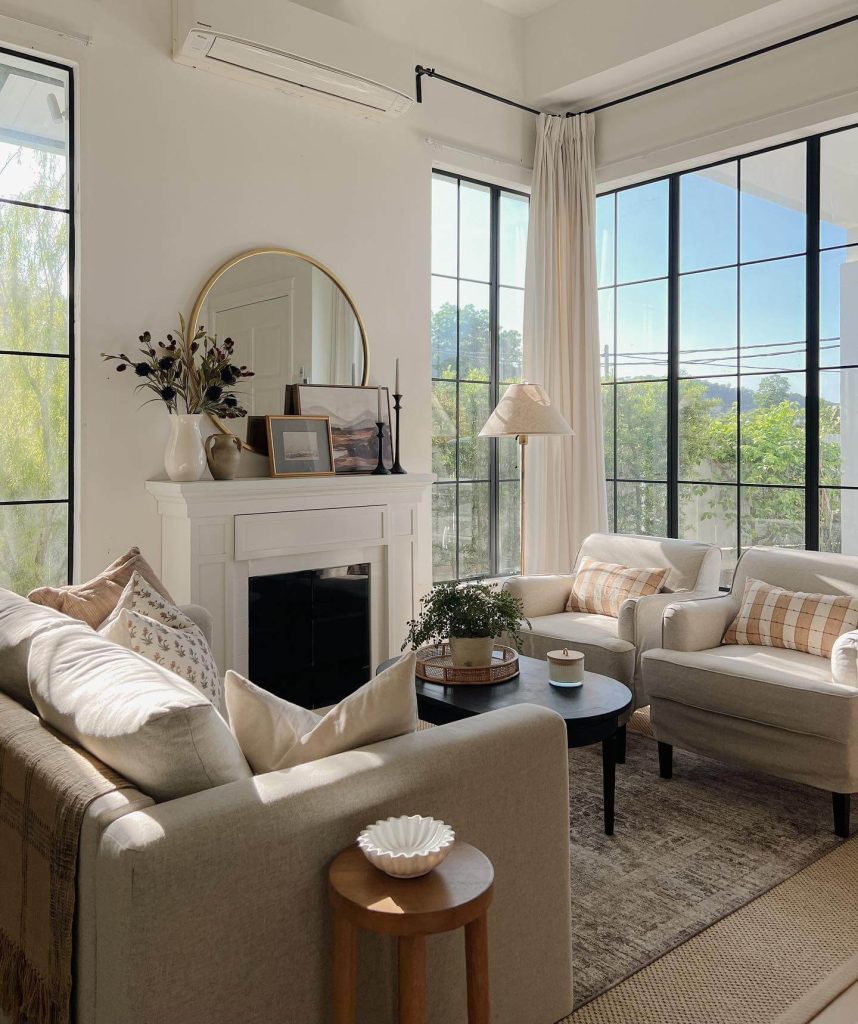 6. Bright and Elegant Living Room with Fireplace and Natural Light