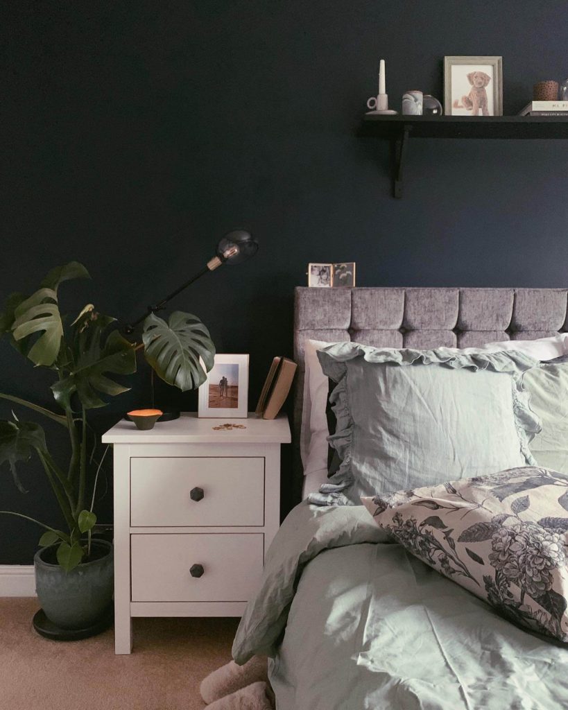 7. Dark & Moody Shelf with Soft Vintage Charm