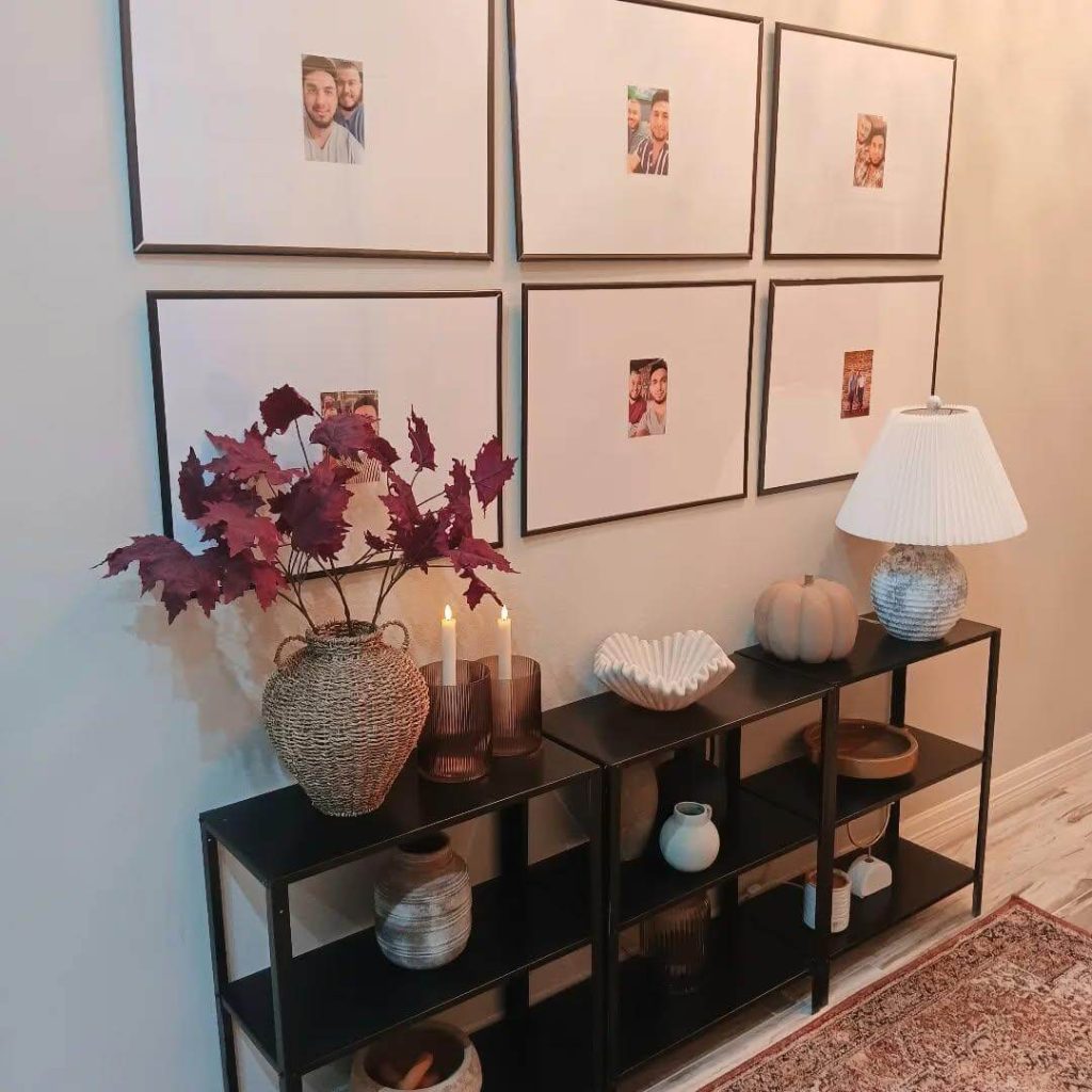 7. Elevate Hallways with Autumn Accents and Moody Foliage