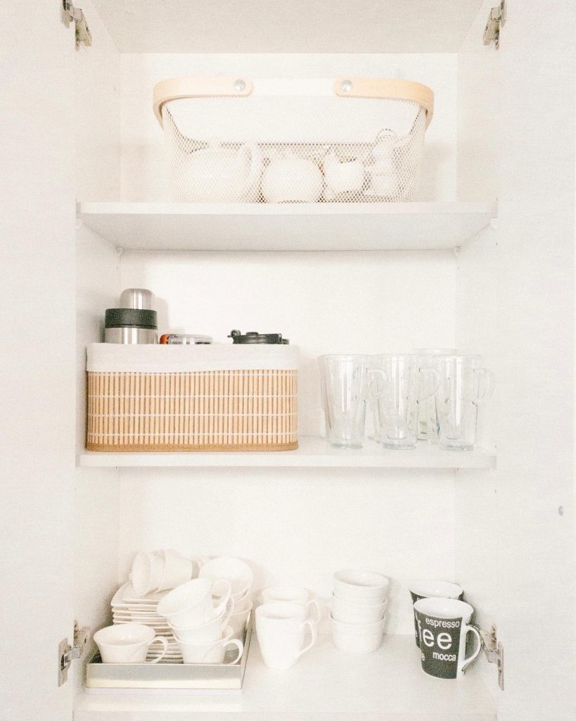 7. Compartmentalized Cupboard for Drinkware and Accessories