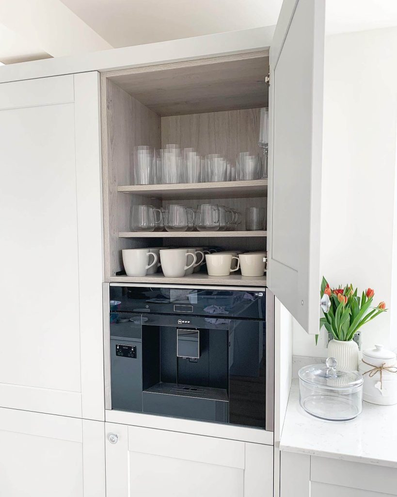 8. Built-In Coffee Station with Integrated Cupboard Storage