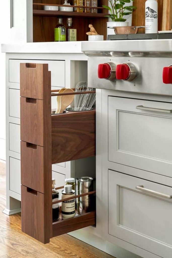 9. Use a Narrow Pull-Out Drawer for Utensils and Bottles