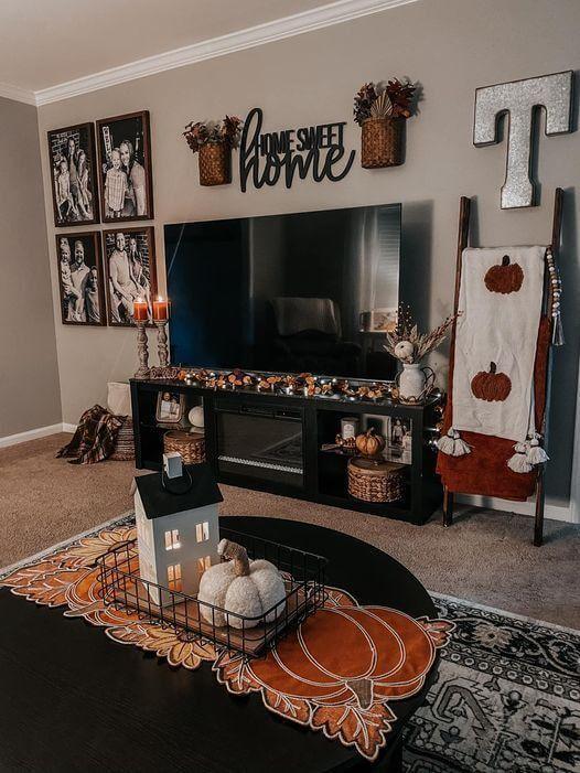 Classic Black TV Stand with Autumn Accents